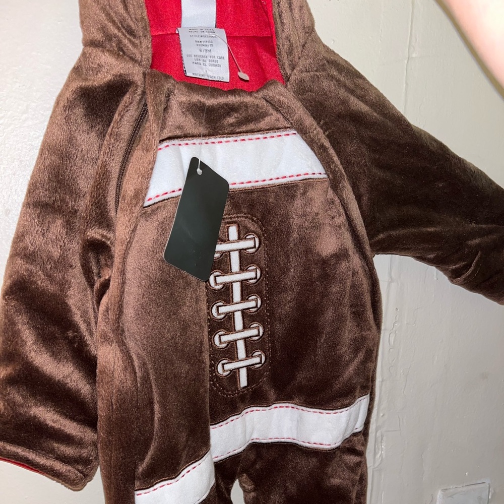 Hooded football style onesie
